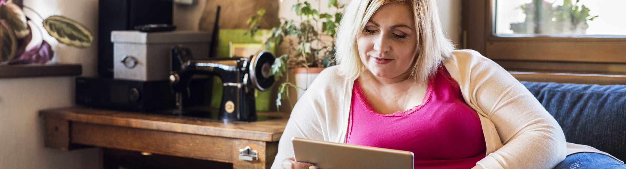 woman shopping on tablet