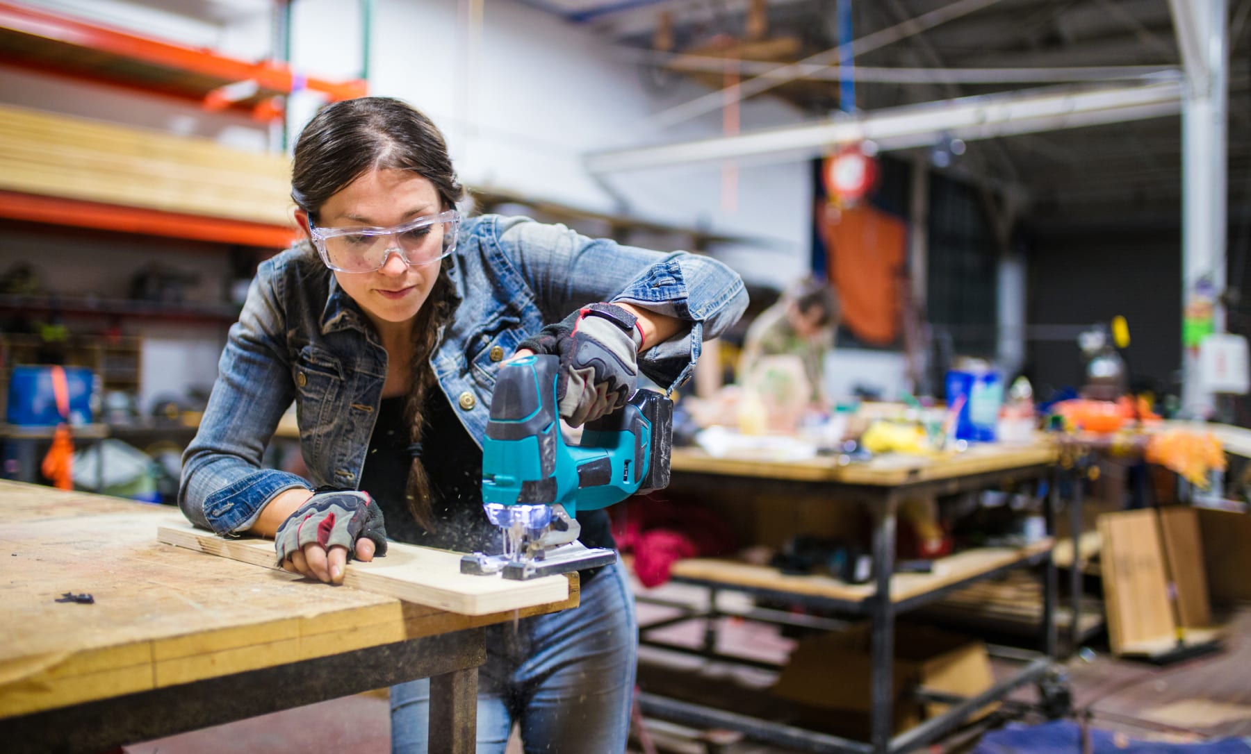 Woman Using Power Saw