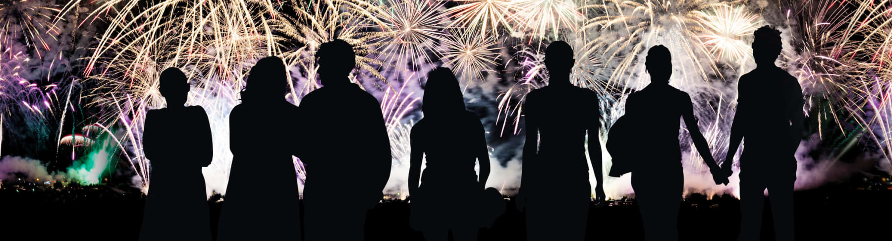 silhouettes in fireworks