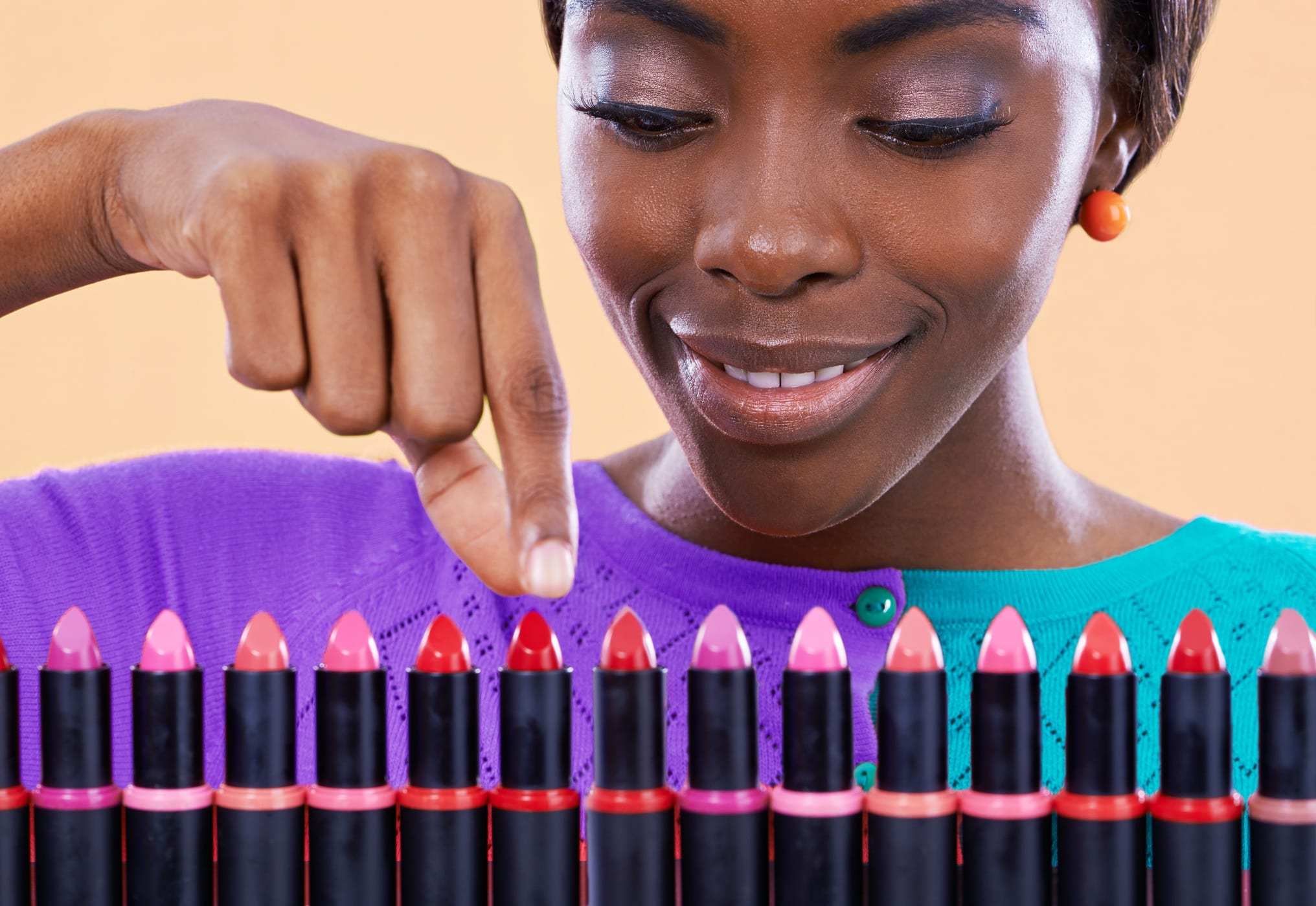 Woman Looking at Lipstick