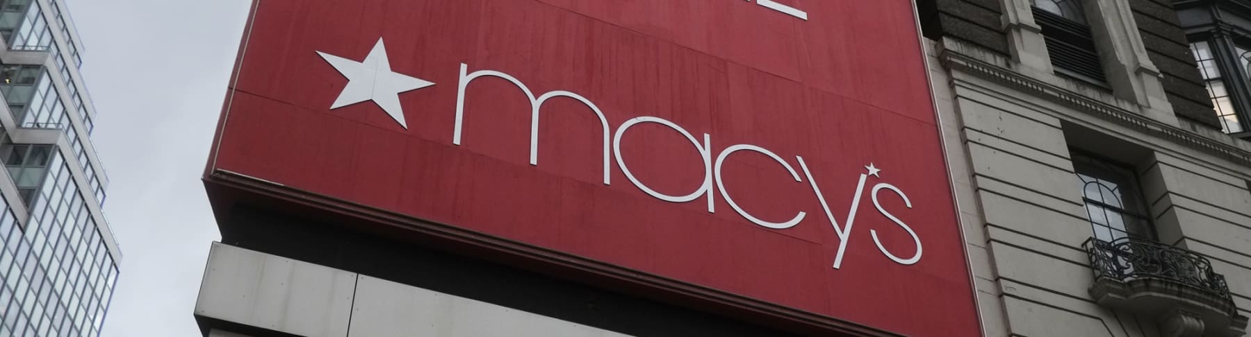 Macy's sign is shown on side of building.