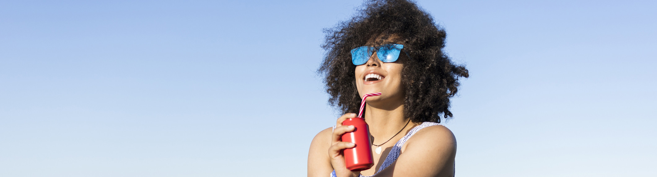 laughing woman with soda
