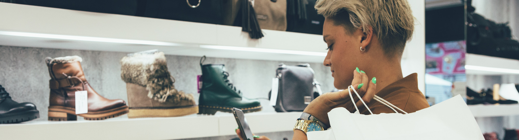 woman checking shoe price