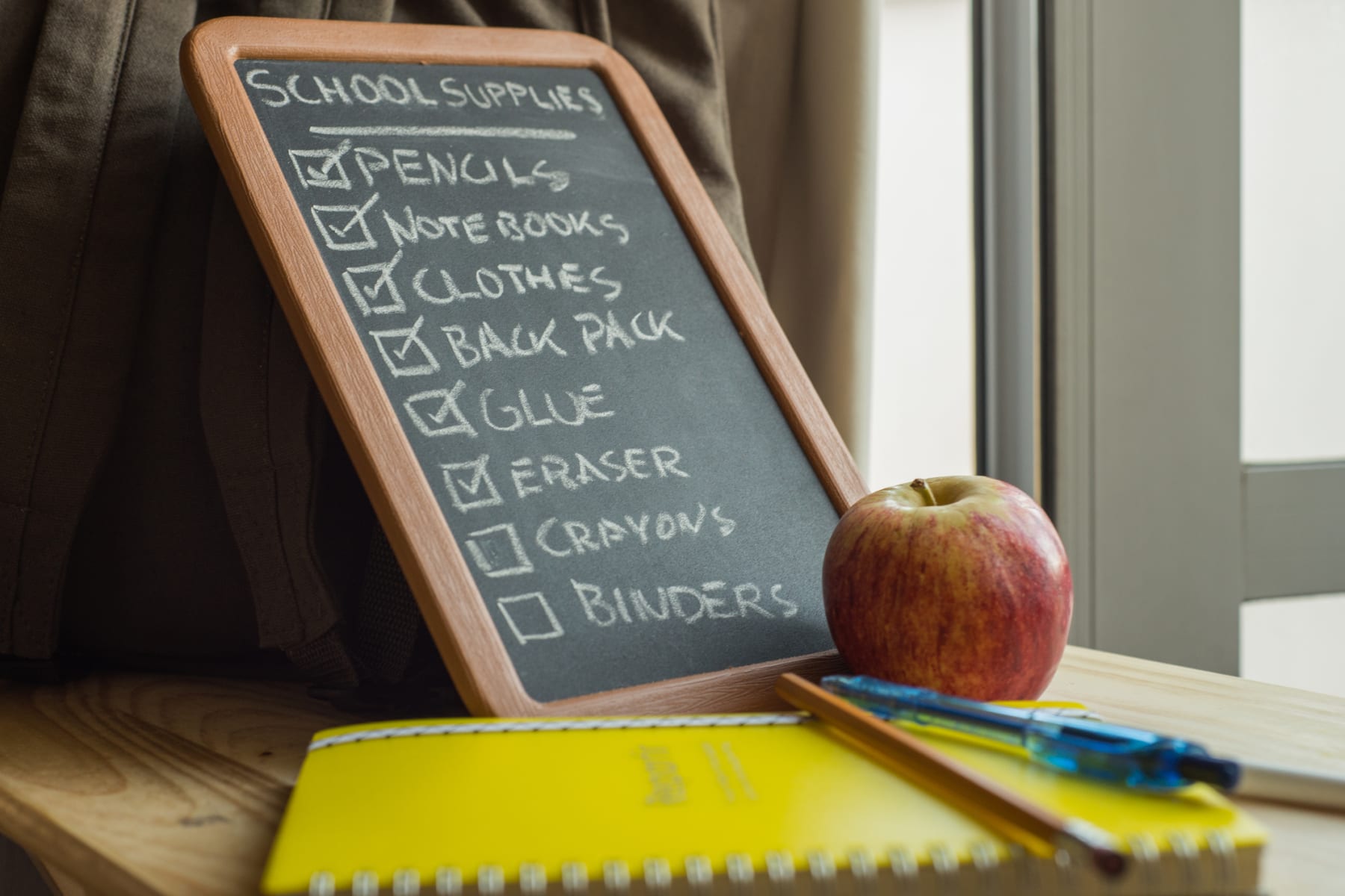 school supply list on chalkboard