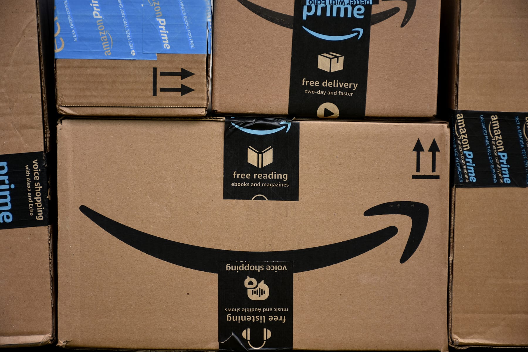 Amazon boxes stacked on top of each other.