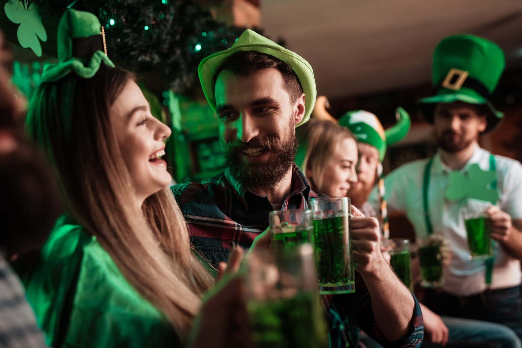 Group of young people celebrate St. Patrick's Day.