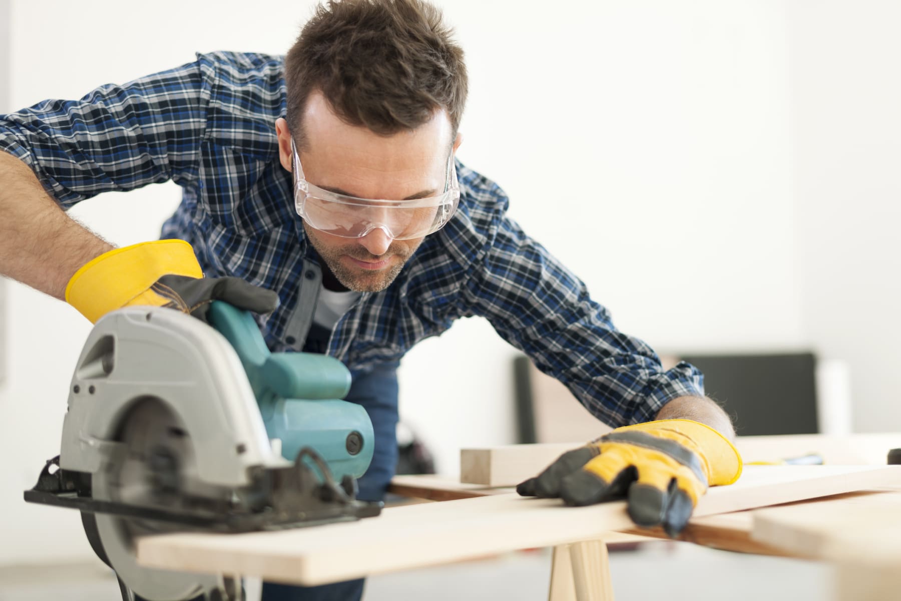 man using saw