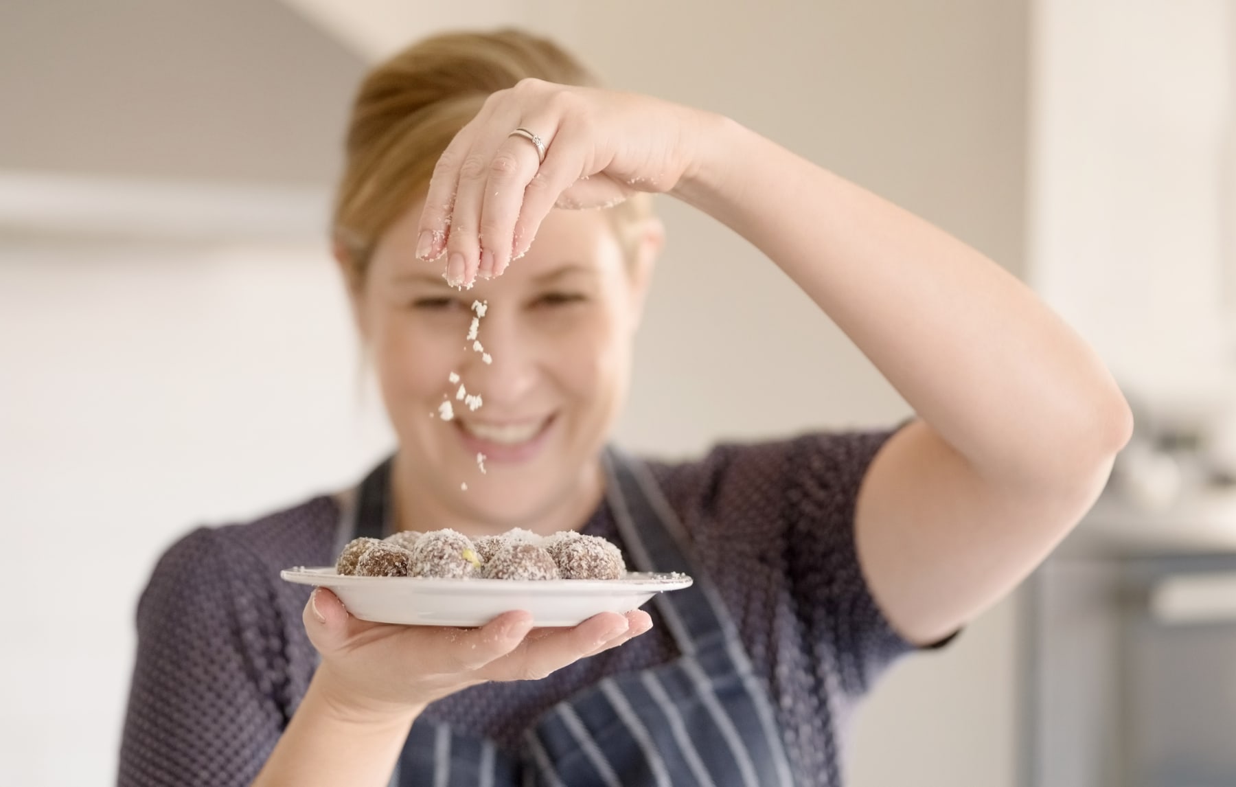 woman making chocolate truffles