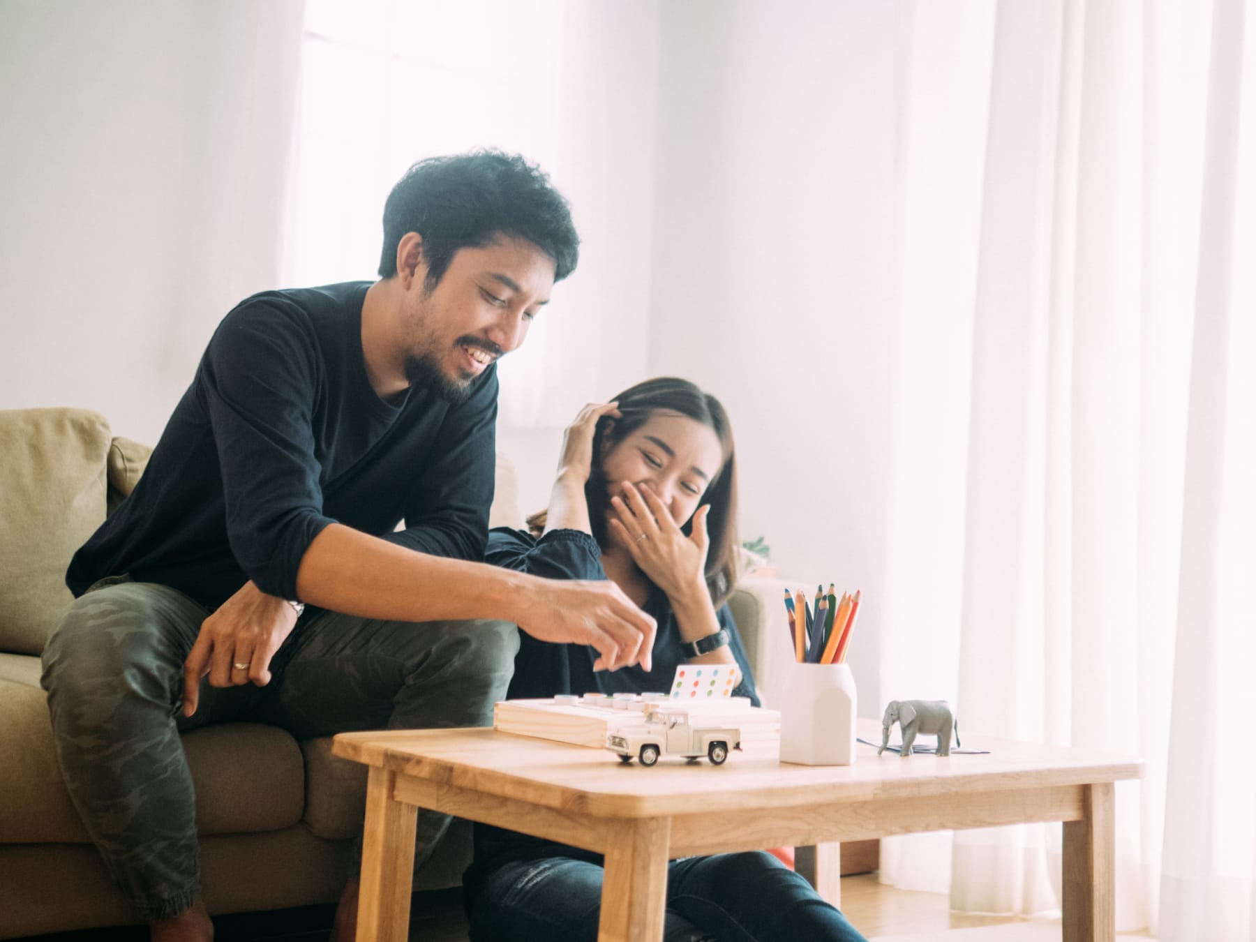 couple playing board game
