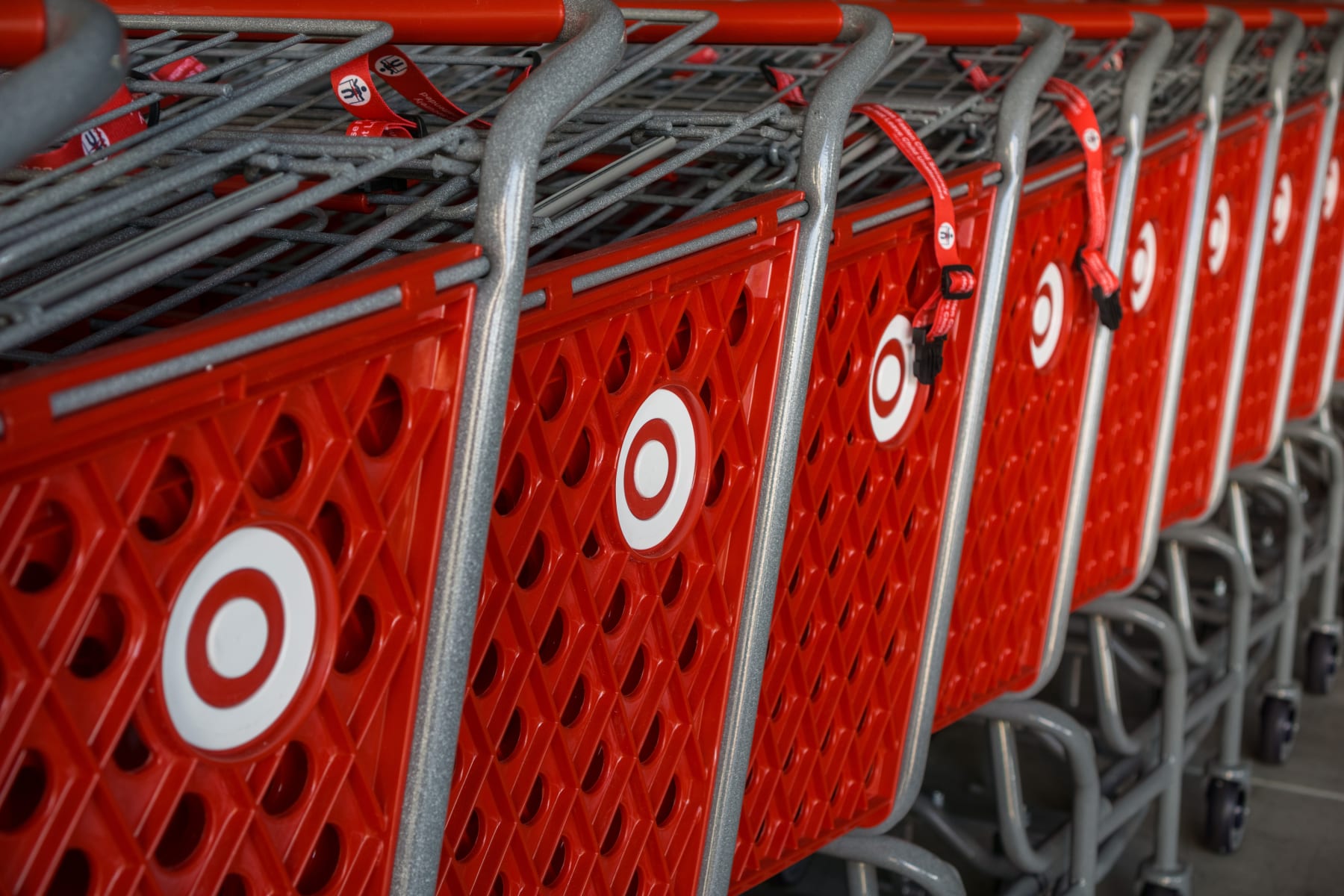 A row of Target store carts are shown.