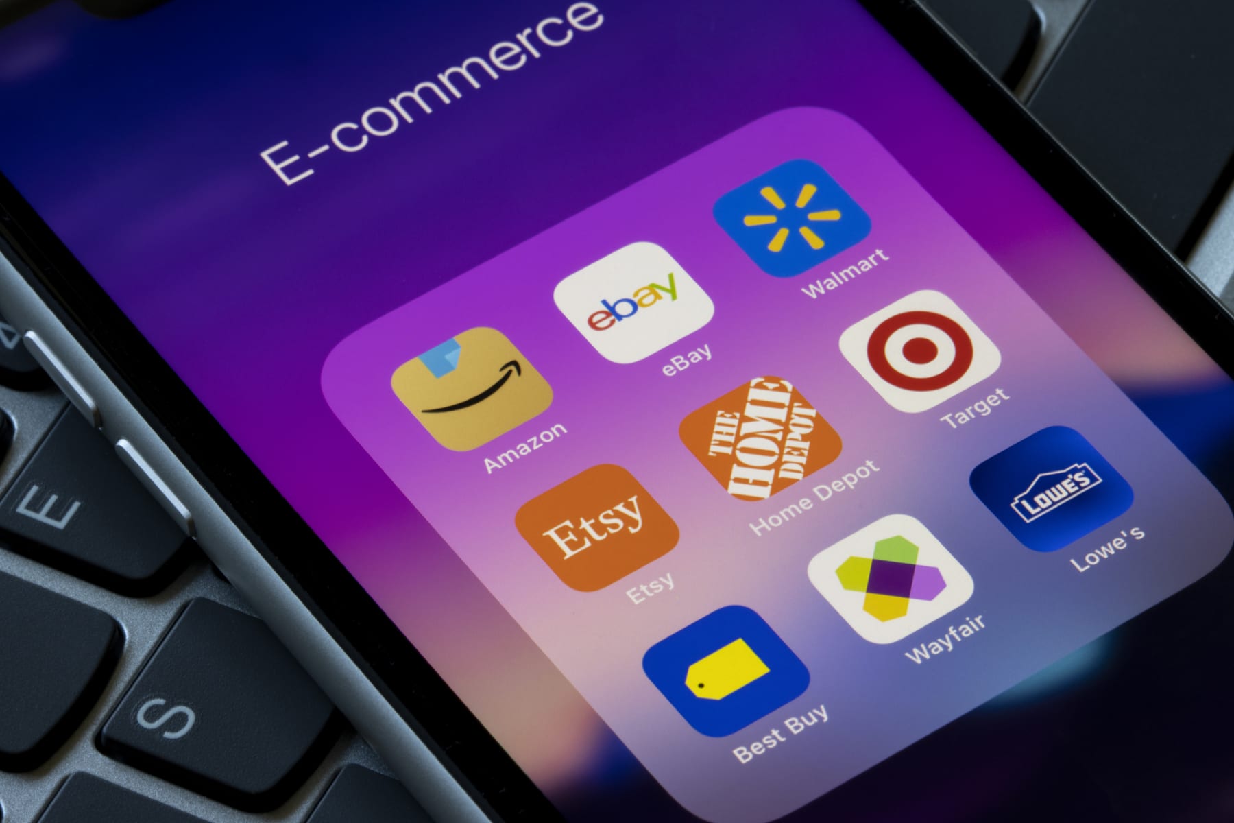 A smartphone screen showing a selection of e-commerce app icons.