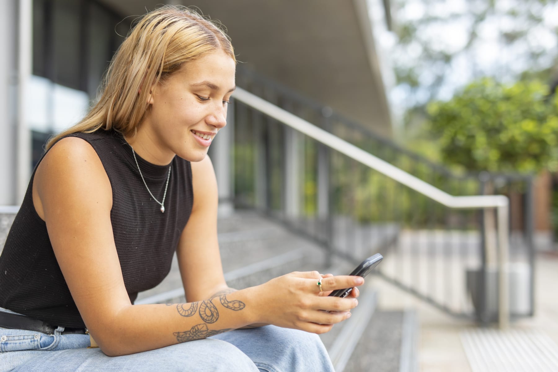 Young person looking at phone.