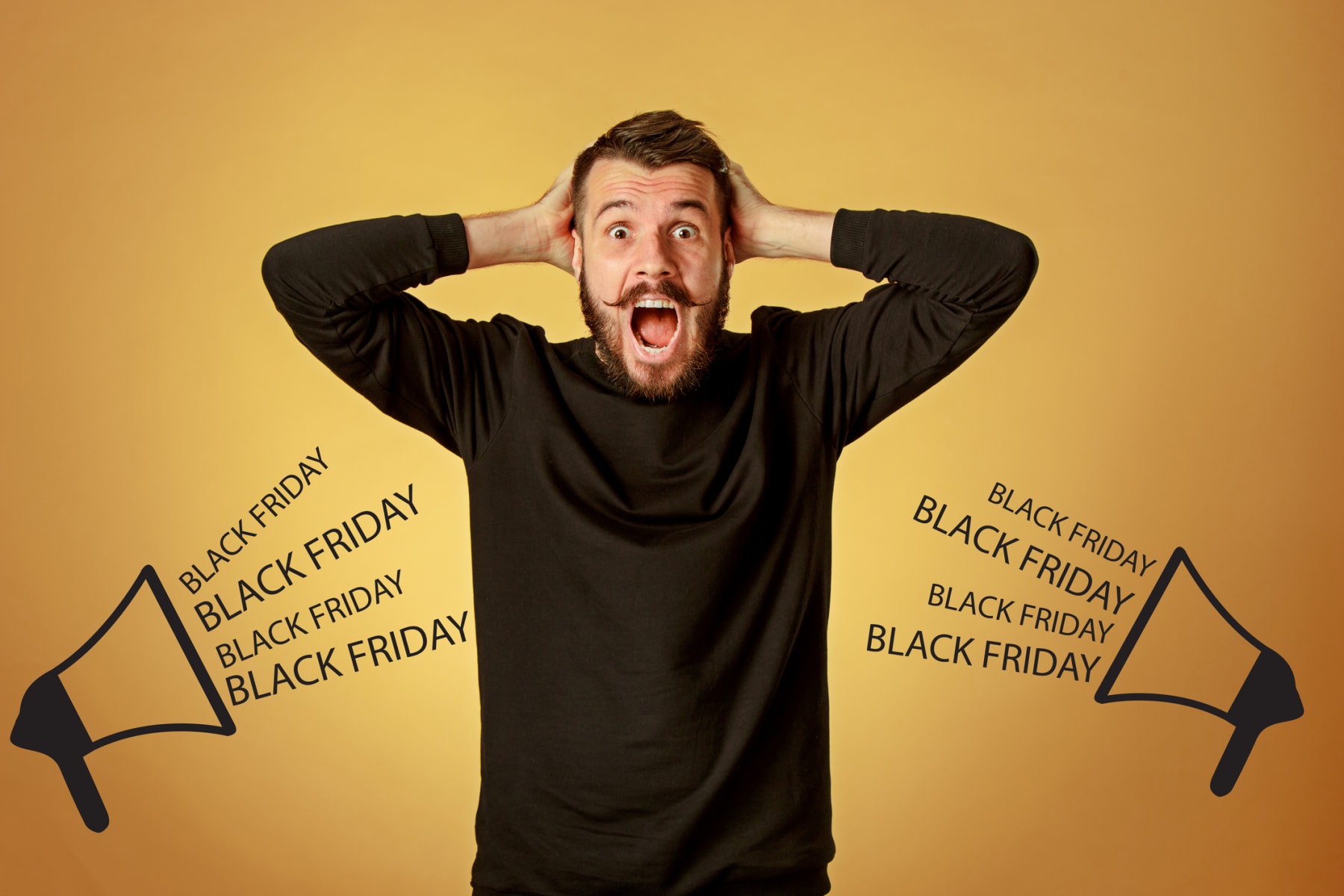 Overwhelmed man stands between megaphones announcing Black Friday.