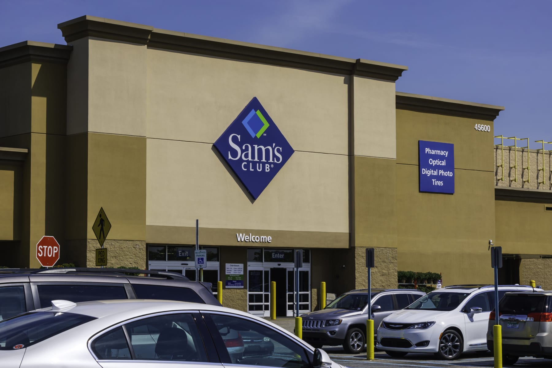 Sam's Club storefront is shown in daylight.