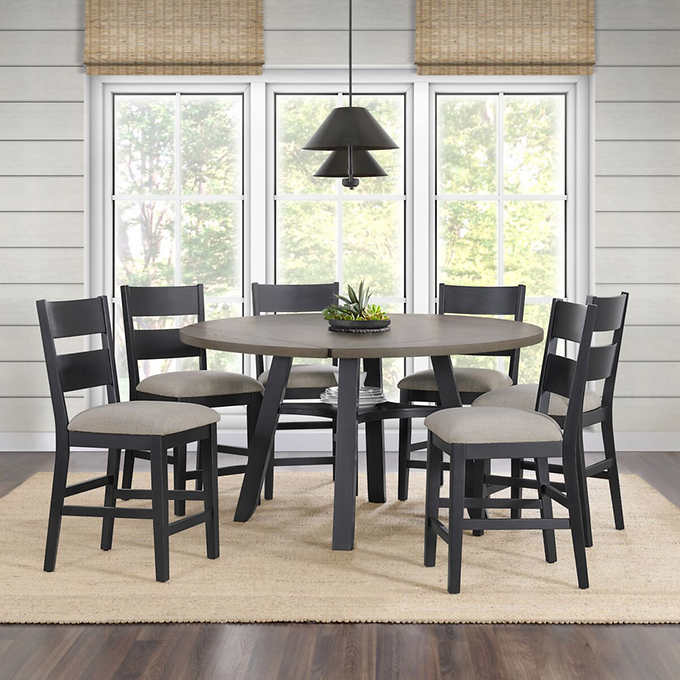 A dining table and chairs set.