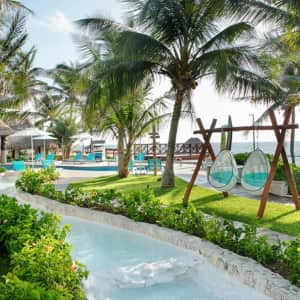 4-Night All-Inclusive Margaritaville Cancun Flight & Resort Vacation: From $1,398 for 2