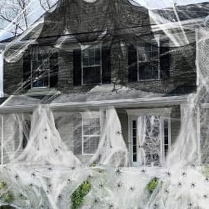 1500-sq. ft. Spider Web + 100 Fake Spiders + 72" x 30" Black Cloths: $10