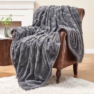Krifey 50" x 60" Faux Fur Throw Blanket: $9.99