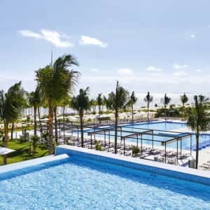 All-Inclusive 4-Night RIU Palace Costa Mujeres Flight & Hotel Vacation: From $1,178 for 2