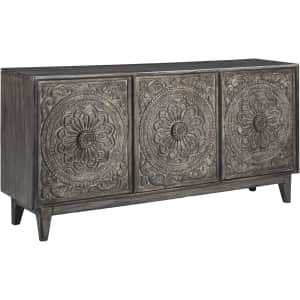 Signature Design by Ashley Fair Ridge Boho Hand Carved Wood Accent Cabinet for $1,051