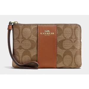 Coach Outlet Corner Zip Wristlet In Signature Canvas for $31