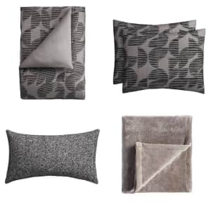 Room Essentials 4-Piece Twin/Twin XL Geo Reversible Comforter Set for $14