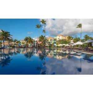 3- or 5-Night All-Inclusive Ocean Blue and Sand Beach Resort Stay. Enjoy meals, snacks, WiFi, unlimited drinks by the glass, and more. (This price includes air travel.)