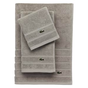 Lacoste Croc Towel, 100% Cotton, 650 GSM, 13"x13" Wash Towel, Pebble for $8