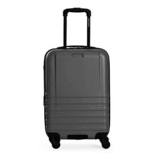 Ben Sherman Hereford 22" Carry-On Hardside Spinner Luggage for $50