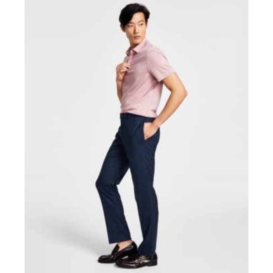 Calvin Klein Men's Slim-Fit Performance Dress Pants: $24