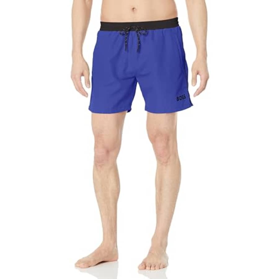 BOSS Men's Standard Medium Length Solid Swim Trunk, Electric Violet for $49