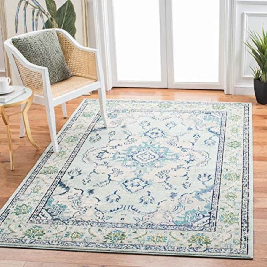 SAFAVIEH Monaco Collection Area Rug - 5'1" x 7'7", Light Blue & Ivory, Boho Chic Medallion for $72