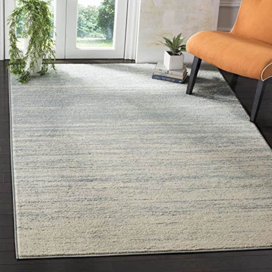 SAFAVIEH Adirondack Collection Area Rug - 5'1" x 7'6", Light Blue & Dark Blue, Modern Ombre Design, for $64