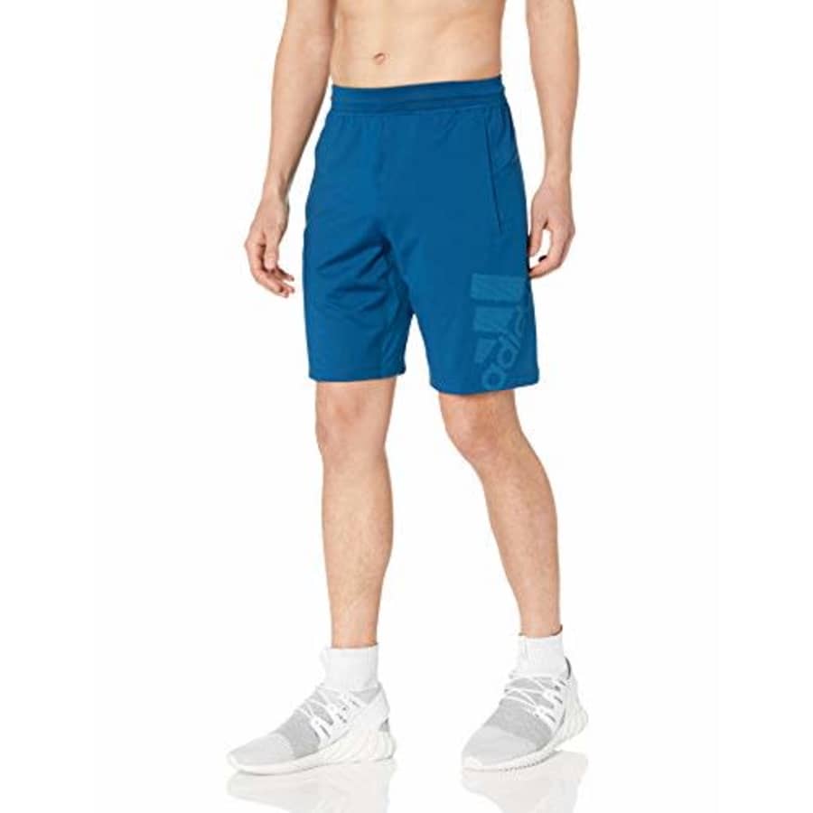 adidas Men's 4Krft Sport Badge of Sport Graphic Shorts, Legend Marine, XX-Large for $27