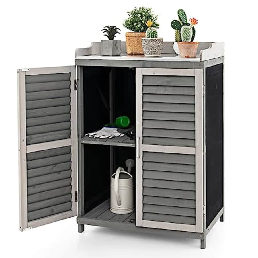 Goplus Outdoor Potting Bench Table, Garden Storage Cabinet w/Metal Tabletop, Roll-up Side Door, for $130