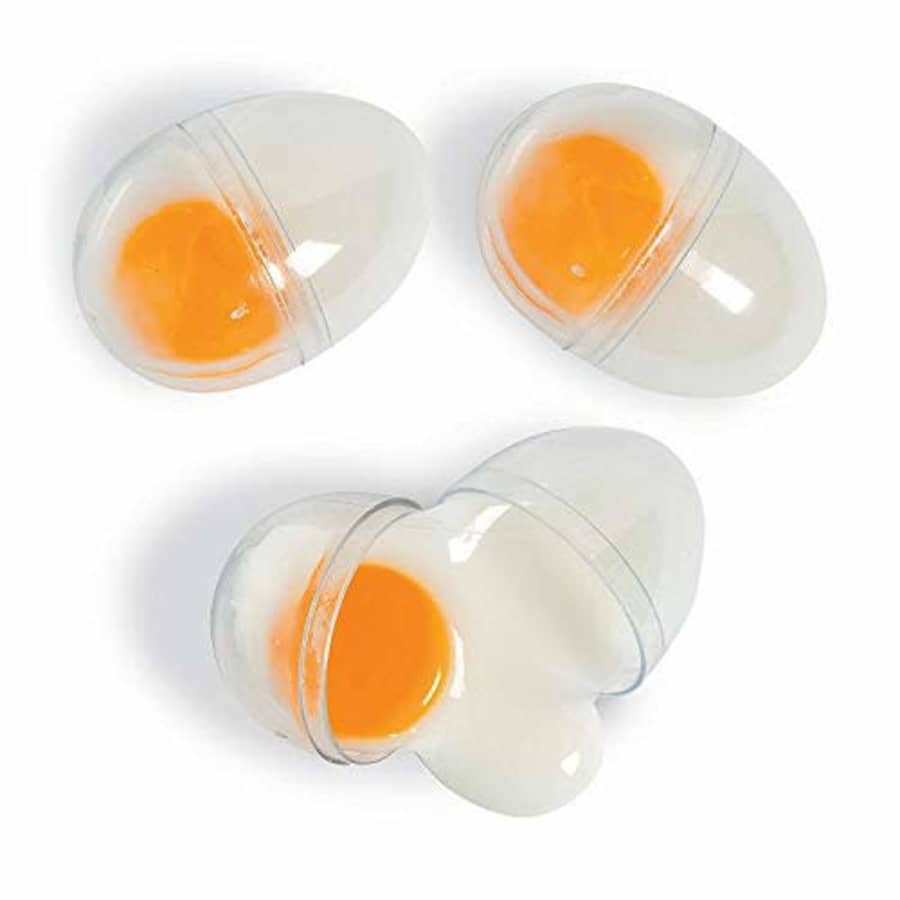 Fun Express EGG YOLK SLIME FILLED EASTER EGG - Party Supplies - 12 Pieces for $17