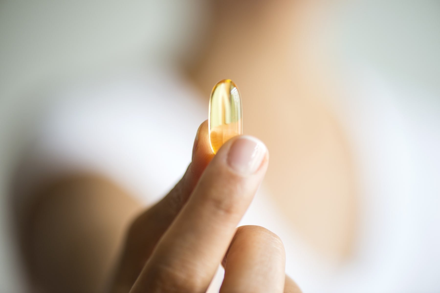 Woman Holding Pill