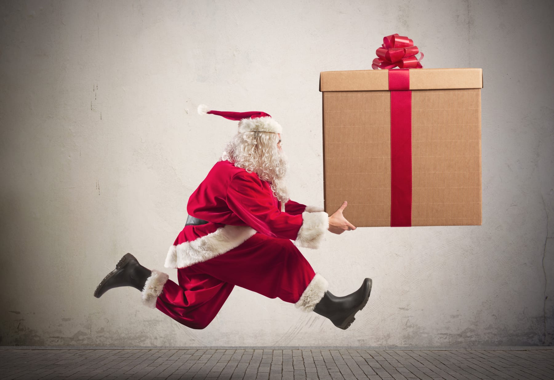 santa running with package