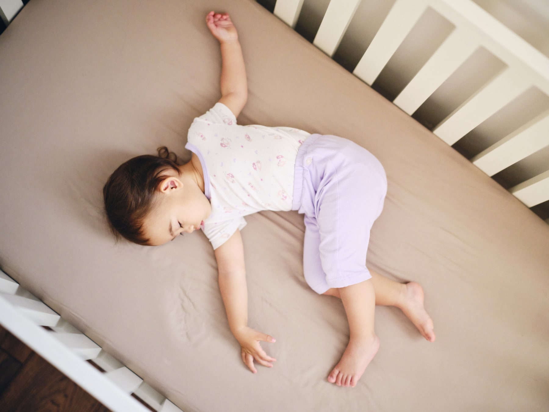 Should You Buy a Crib Mattress Pad