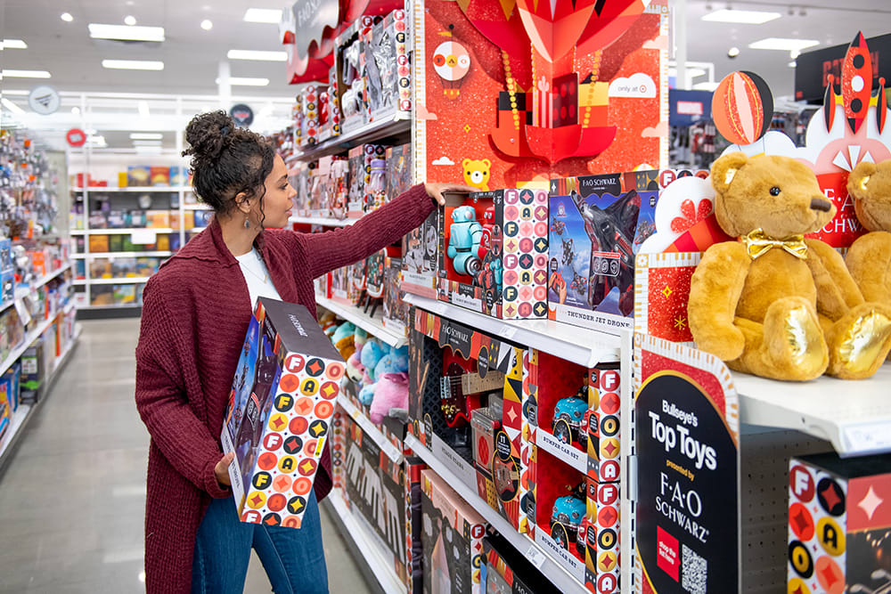 Woman shops for toys at Target store.