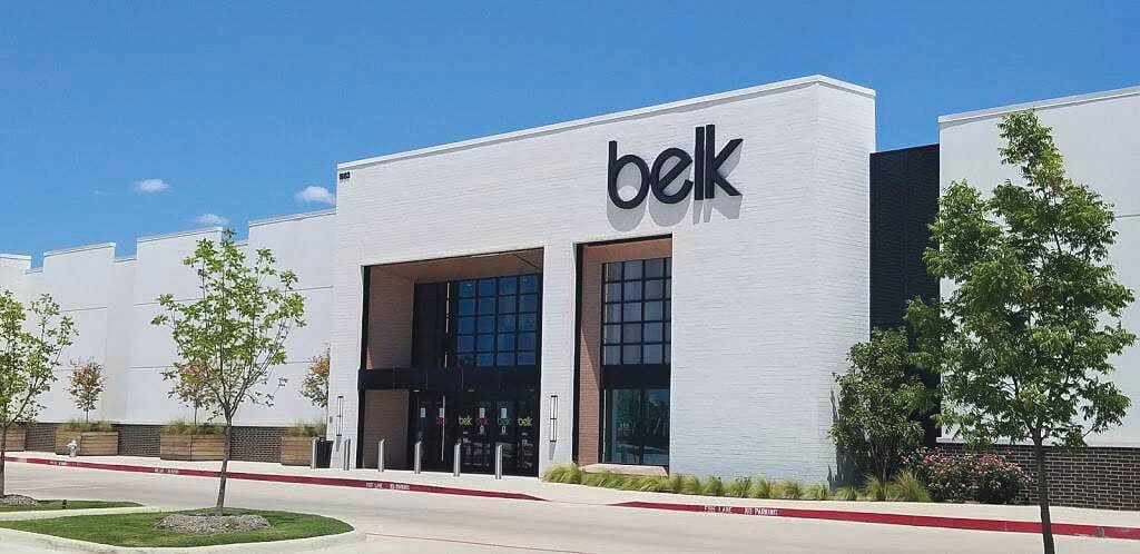 Front of Belk store is shown on sunny day.