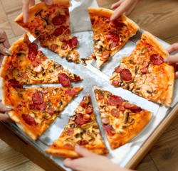 Celebrate National Pizza Day With These Tasty Deals!