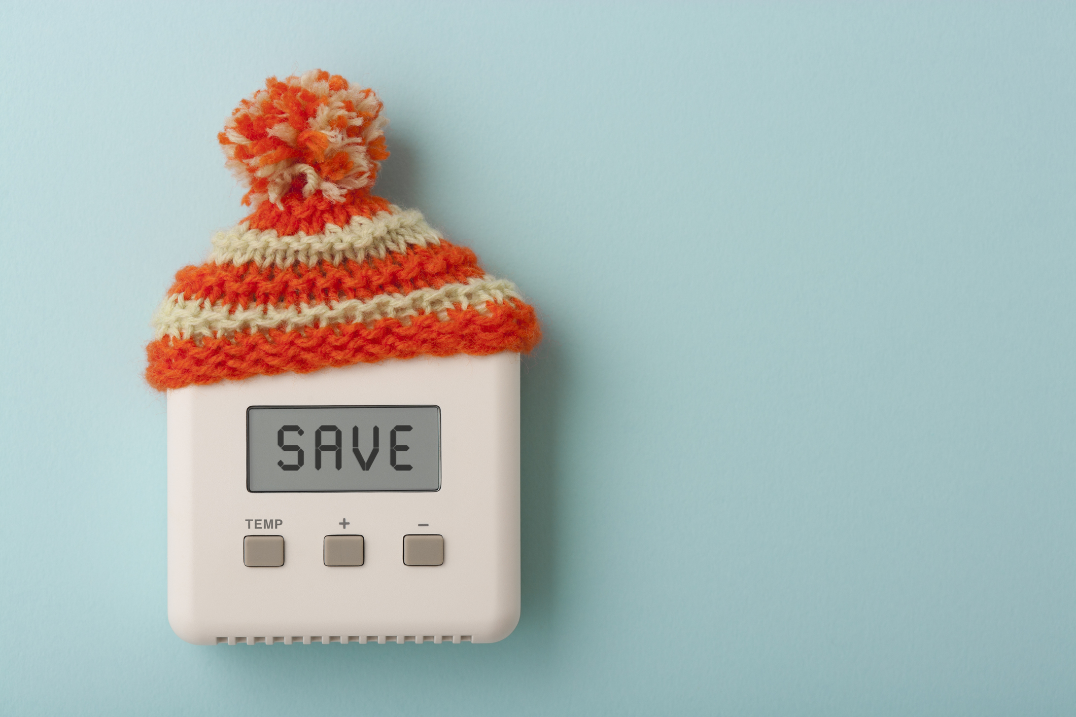 thermostat with hat on it