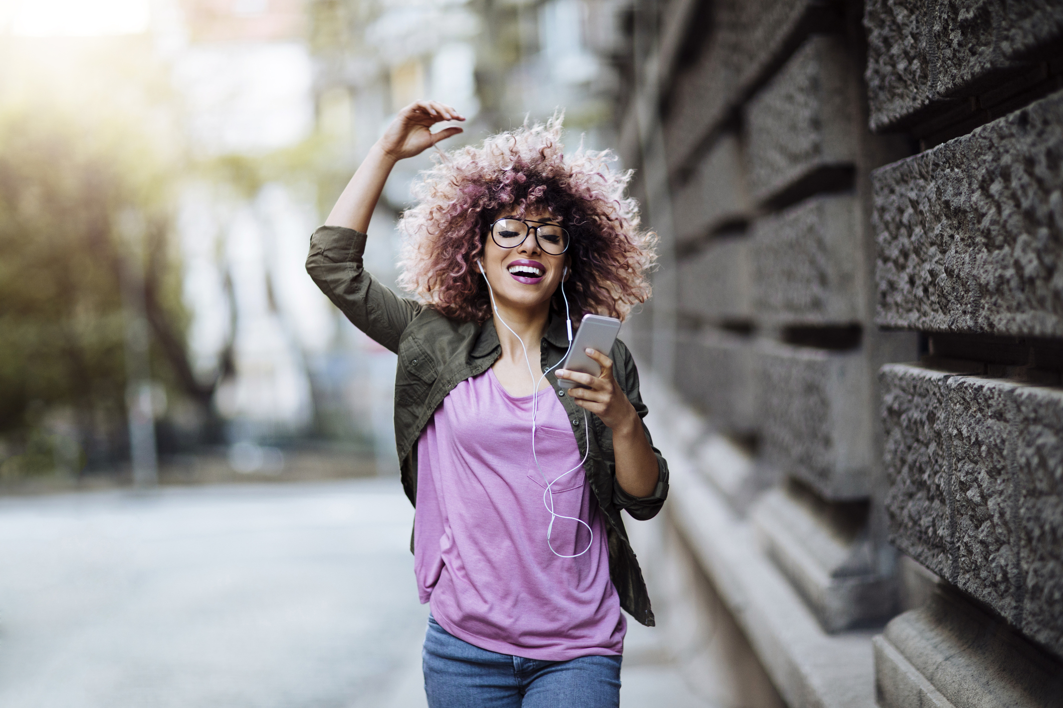 woman listening to podcast